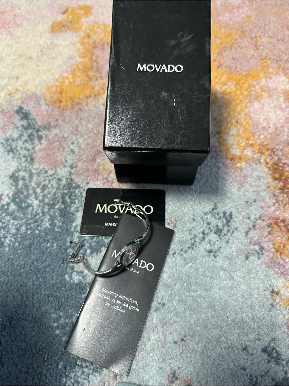 Movado Ladies Bracelet Watch in pink face and Silver band